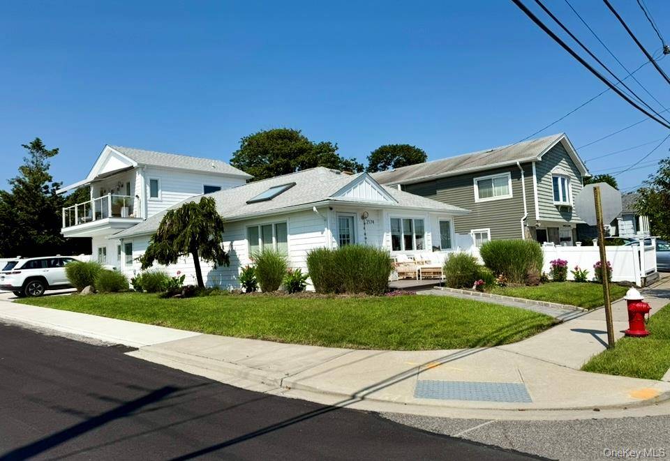 Welcome to this fully renovated, expanded ranch style home, featuring an additional 800 sq.