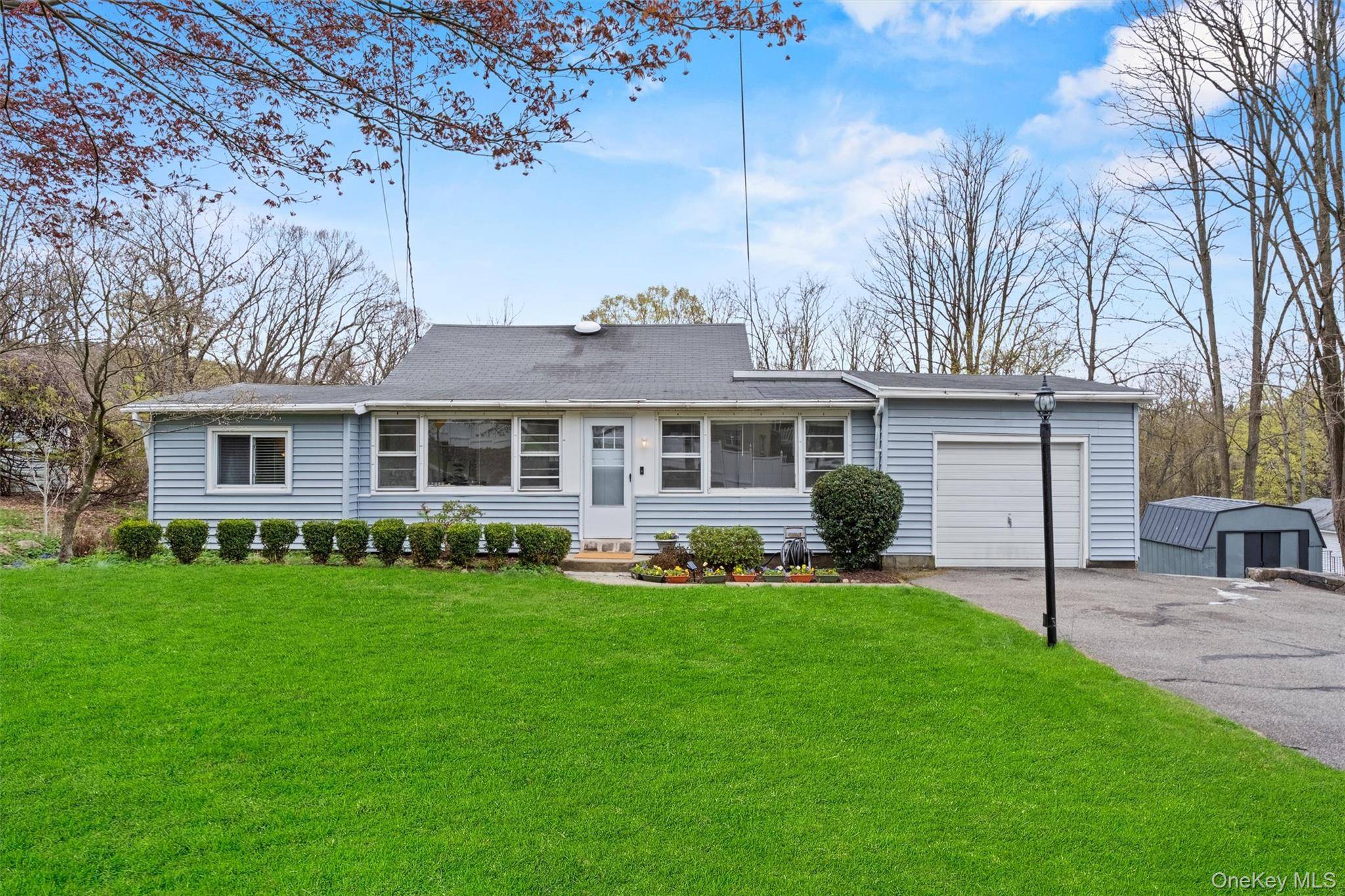 BACK ON THE MARKET IMPROVED PRICE NEW SEPTIC TANK Welcome to this Cozy Ranch in Cortlandt Manor, NY, centrally located between the Peekskill Art District and the Cortlandt Town Center.