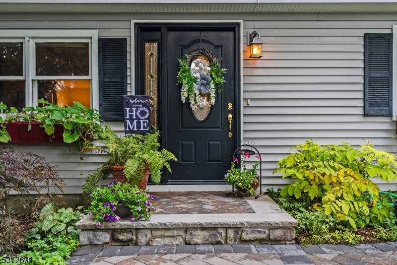 Tucked away on a wooded, elevated lot in one of Denville's most peaceful lake communities, this warm and inviting 3 bedroom, 2 bath home offers a rare blend of privacy, ...