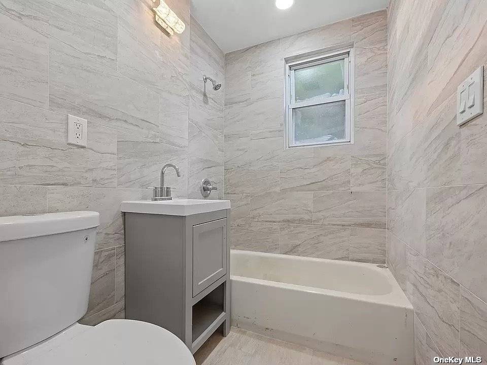 Welcome to 11620 204th St, a stunningly renovated gem in the heart of Queens !