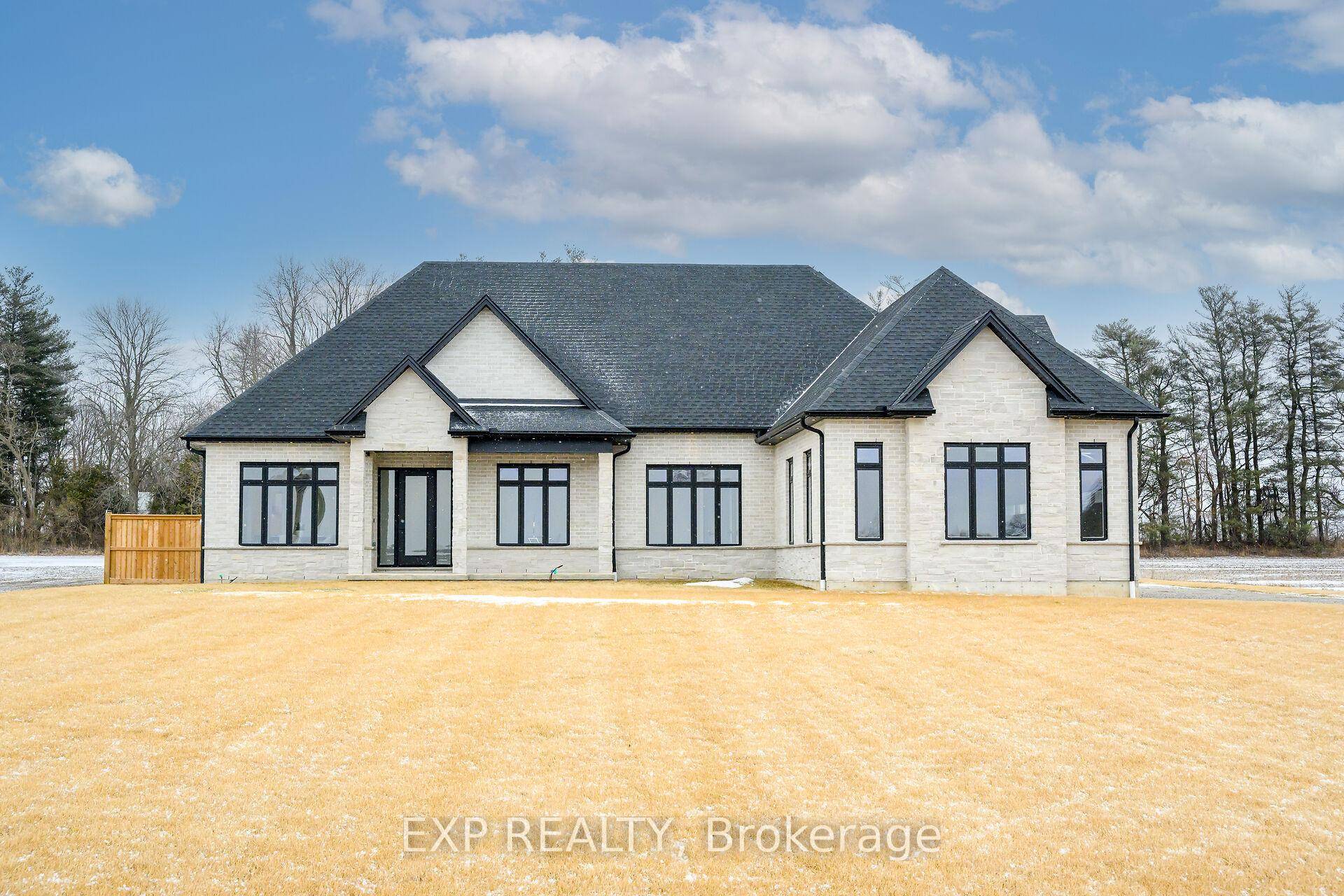Beautiful, spacious, custom, all brick stone bung w almost 3000 sq ft of living space on main.
