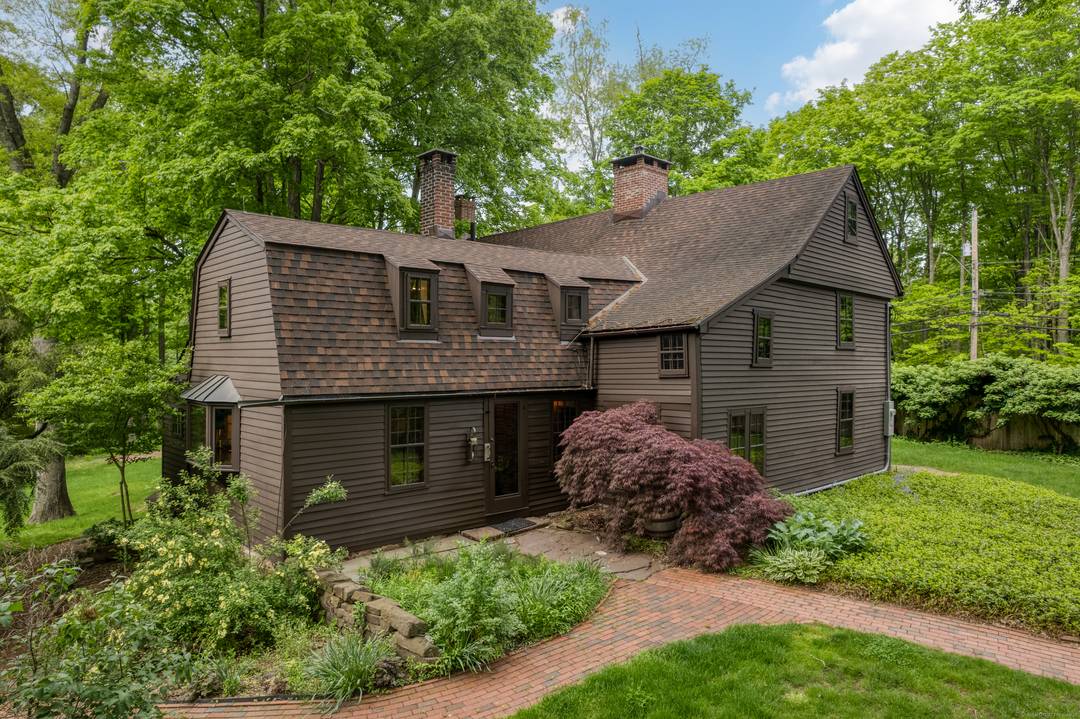 There is room to spare in this wonderful 10 room historic saltbox home that sits on 3.