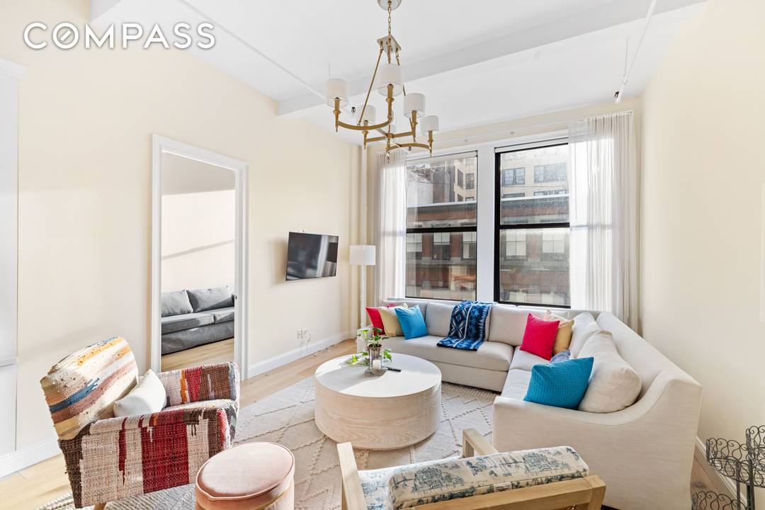 Residence 8D at 222 Park Avenue South is an impeccably maintained, light filled home that blends classic pre war character with modern sophistication.