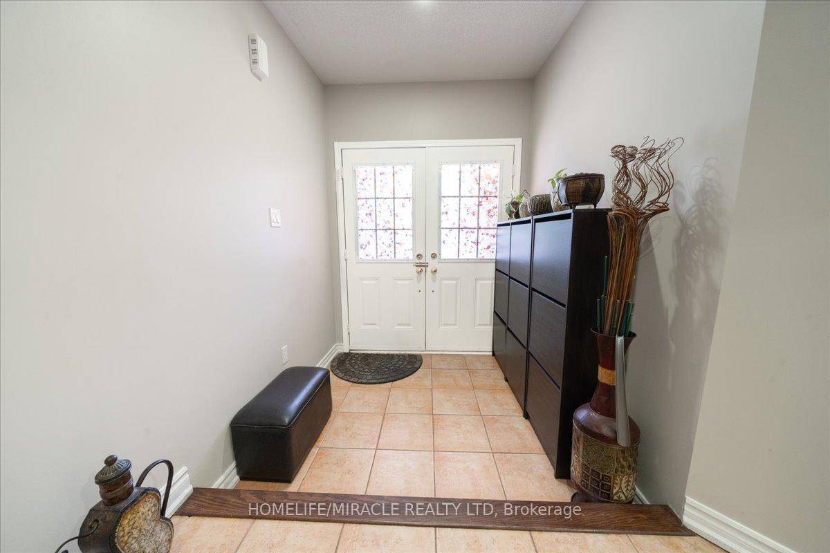 Welcome to this spacious and beautifully maintained semi detached home in the sought after Fletchers Creek Village community, featuring a double door entry.