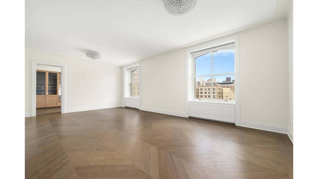 This elegant floor through residence offers three bedrooms and three and a half bathrooms, with both north and south exposures that fill the home with natural light.