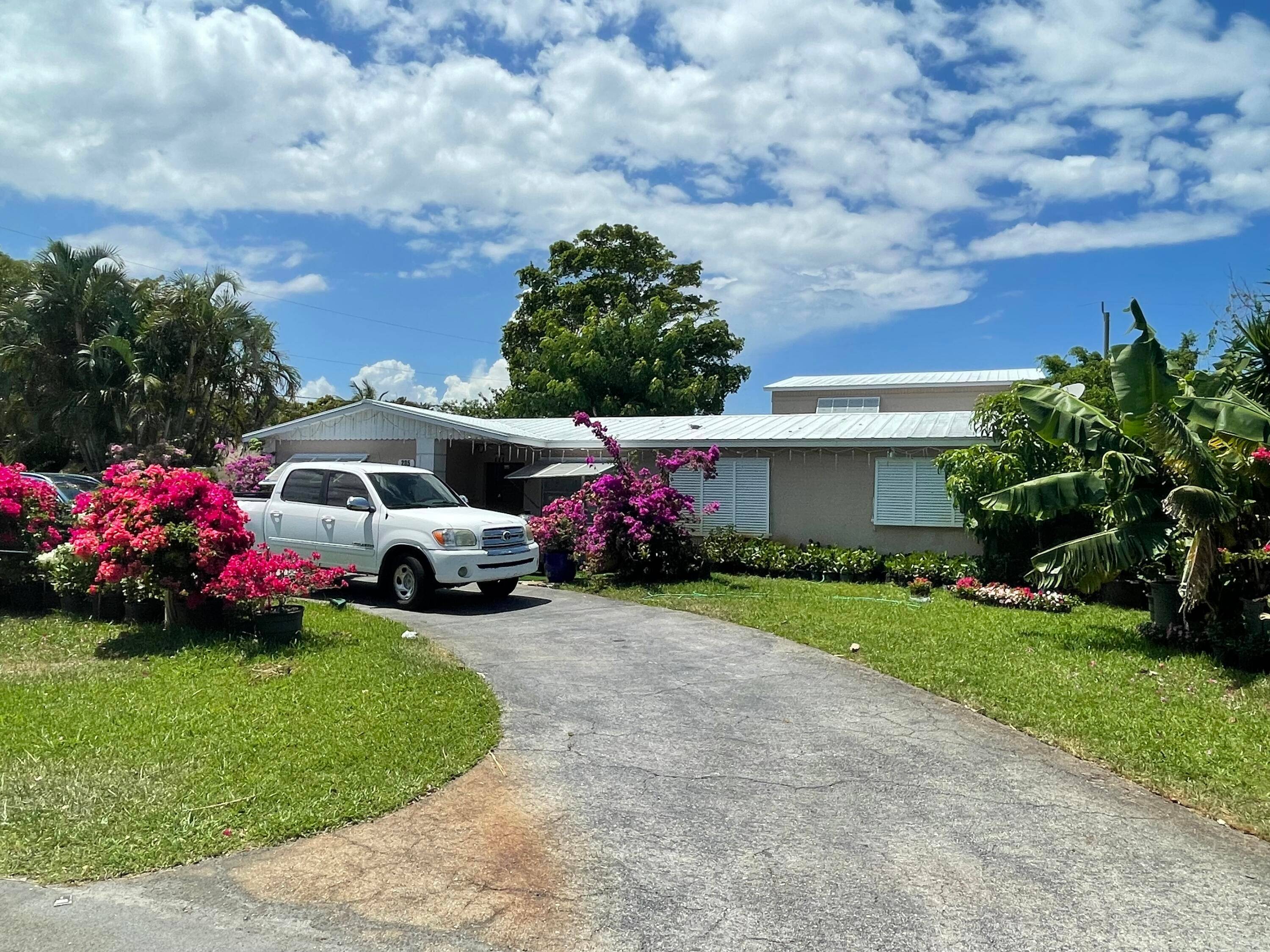 This fantastic property in East Boynton Beach offers a unique opportunity for both homeowners and investors.