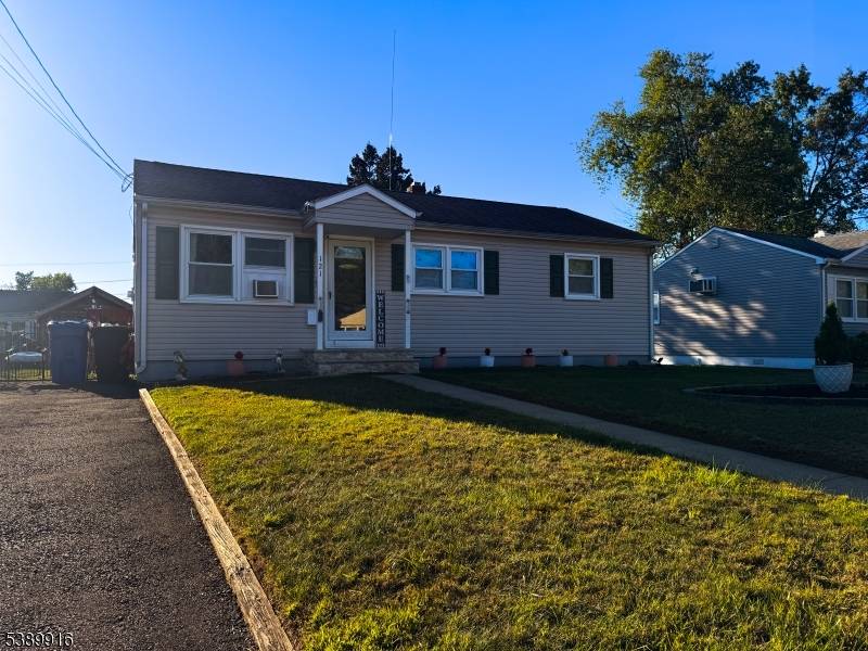 This charming 3 bedroom 1 bath ranch home exudes warmth and comfort.