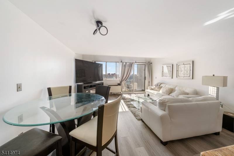 Welcome Home This meticulously maintained 2 bedrooms, 1 1 2 bathrooms, two level loft style condo.