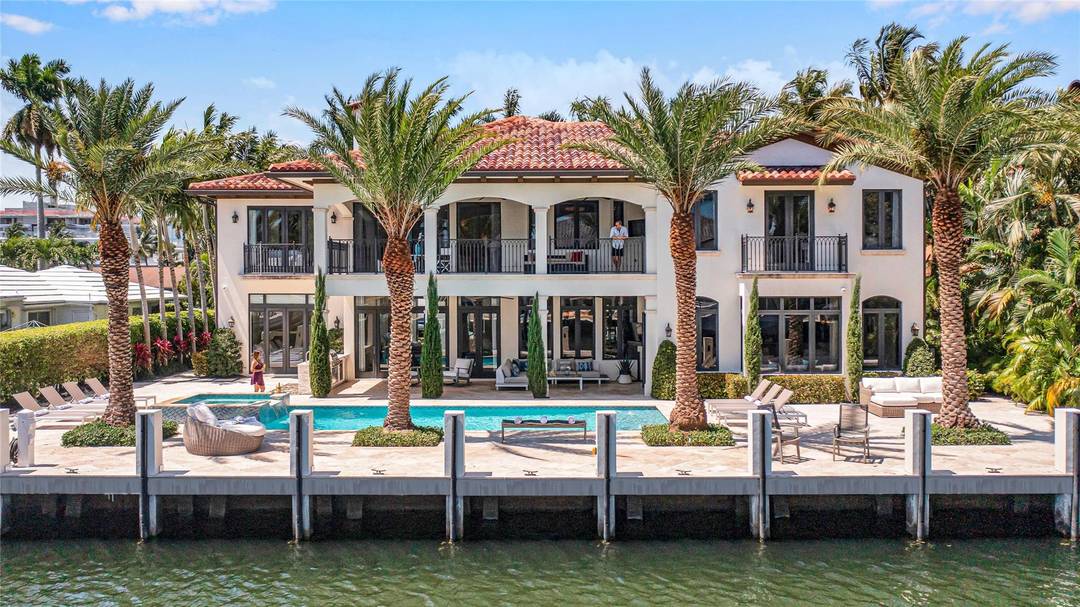 Stunning transitional deepwater estate on 95 feet of prime Las Olas waterage with eastern exposure.