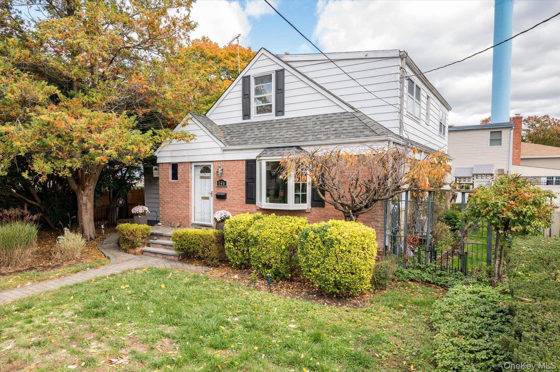 Charming 4 Bedroom, 2. 5 Bath Cape Cod in Garden City South Welcome to this beautifully maintained Cape Cod home located in the desirable Garden City South neighborhood.