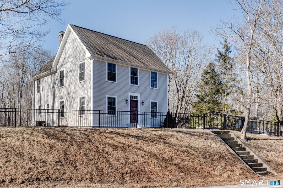Welcome to 353 Warrenville Rd, a beautifully rebuilt 2008 3 bedroom, 2 full bath home that perfectly blends modern updates with classic New England charm.
