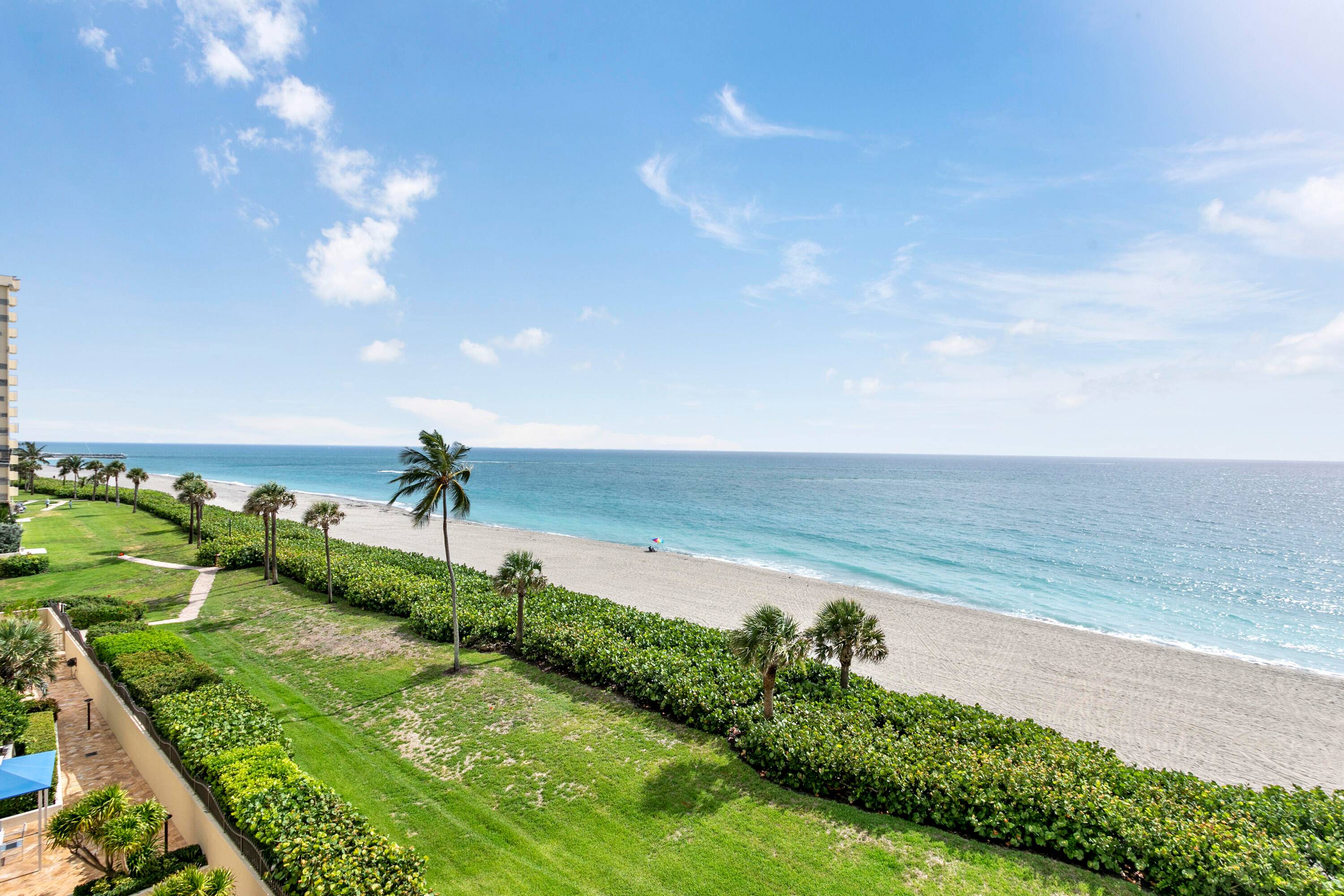 This 5th floor OCEAN END UNIT has 2 bedrooms and 2 baths and sits directly on the beach in Jupiter.