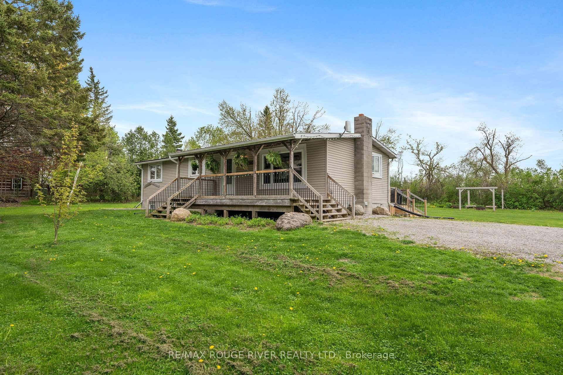 This lovingly maintained 3 bedroom open concept bungalow sits on a picturesque, sprawling lot surrounded by meticulously cared for perennial and vegetable gardens.