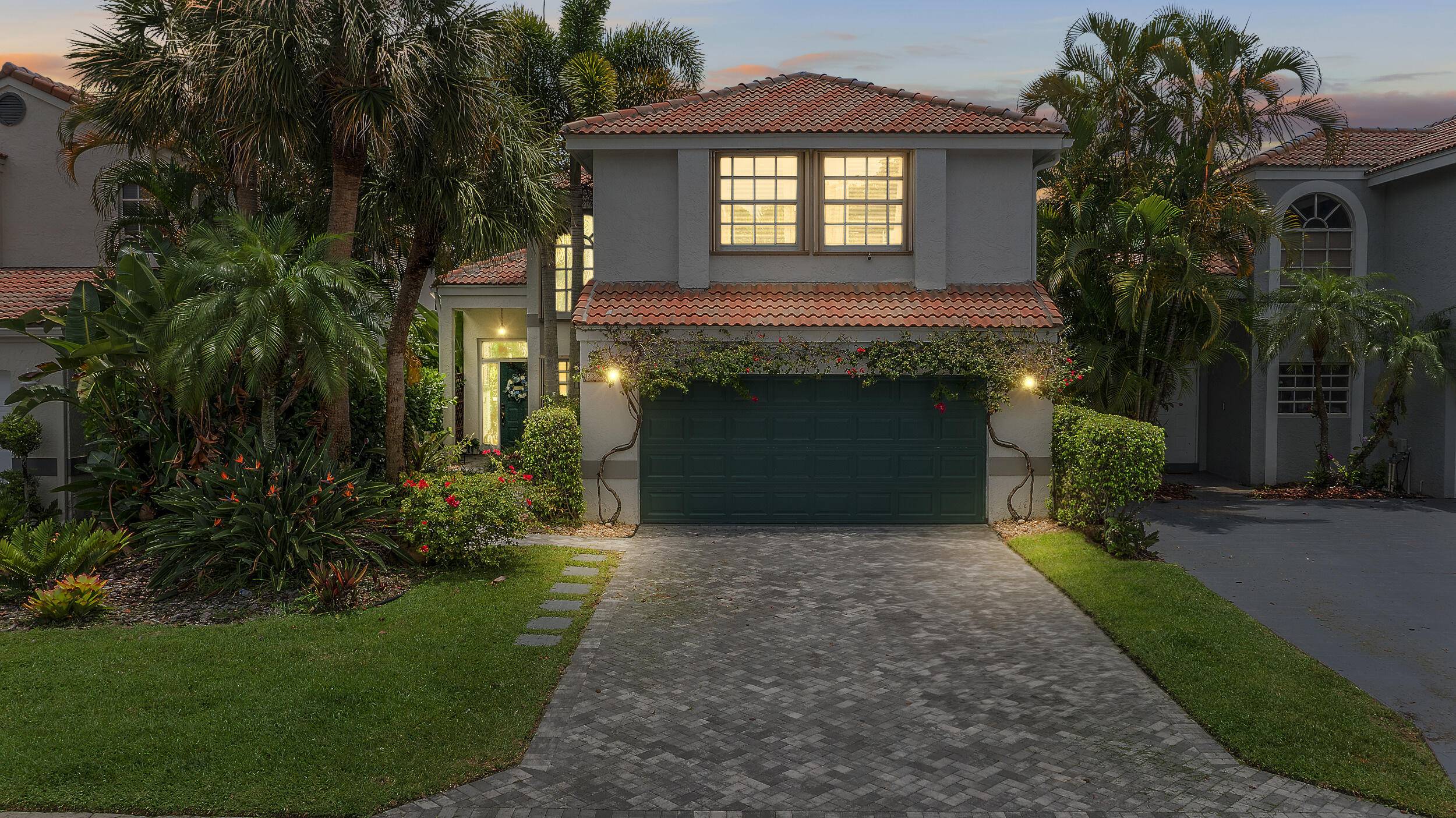 Stunning Lakefront home located in La Vida, exclusive community in Boca del Mar.