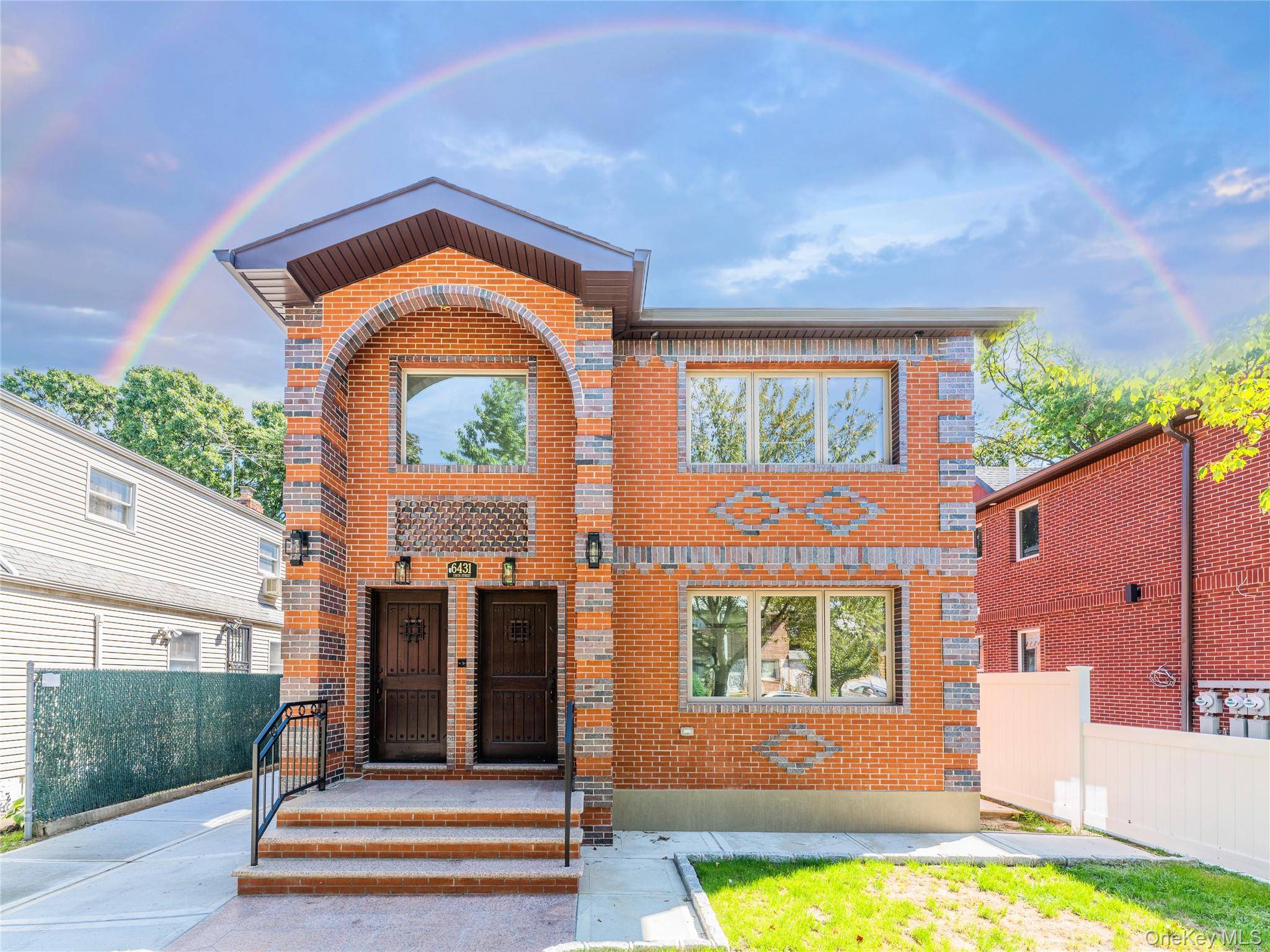Welcome to this a newly constructed, 100 brick two family home perfectly blending elegance, comfort, and investment potential.