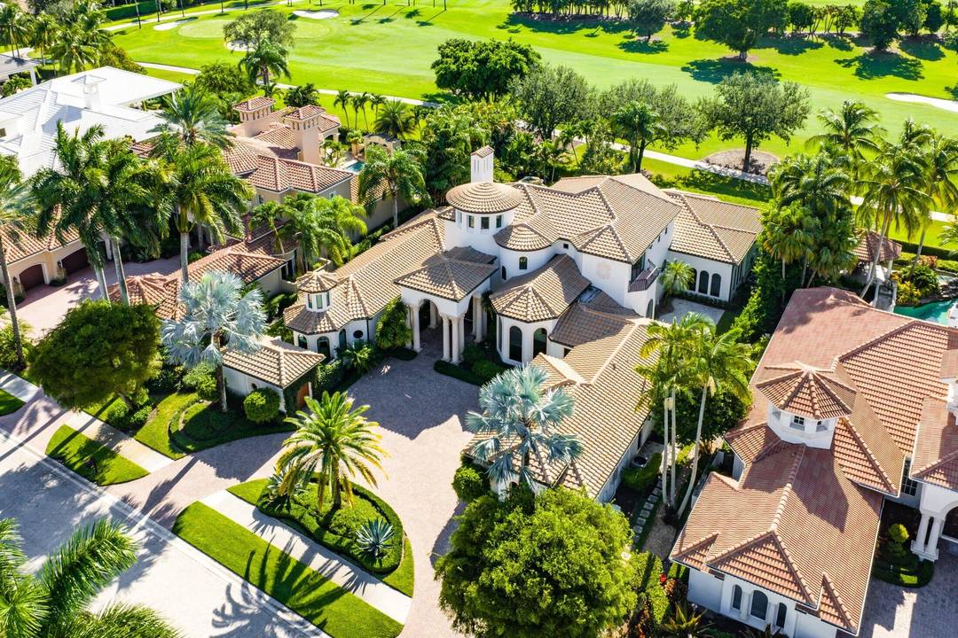 THIS IS THE ONE ! Luxury, privacy, and the prestige of a Grand Pointe address 207 Grand Pointe Drive is one of BallenIsles' original signature estates and a rare opportunity ...