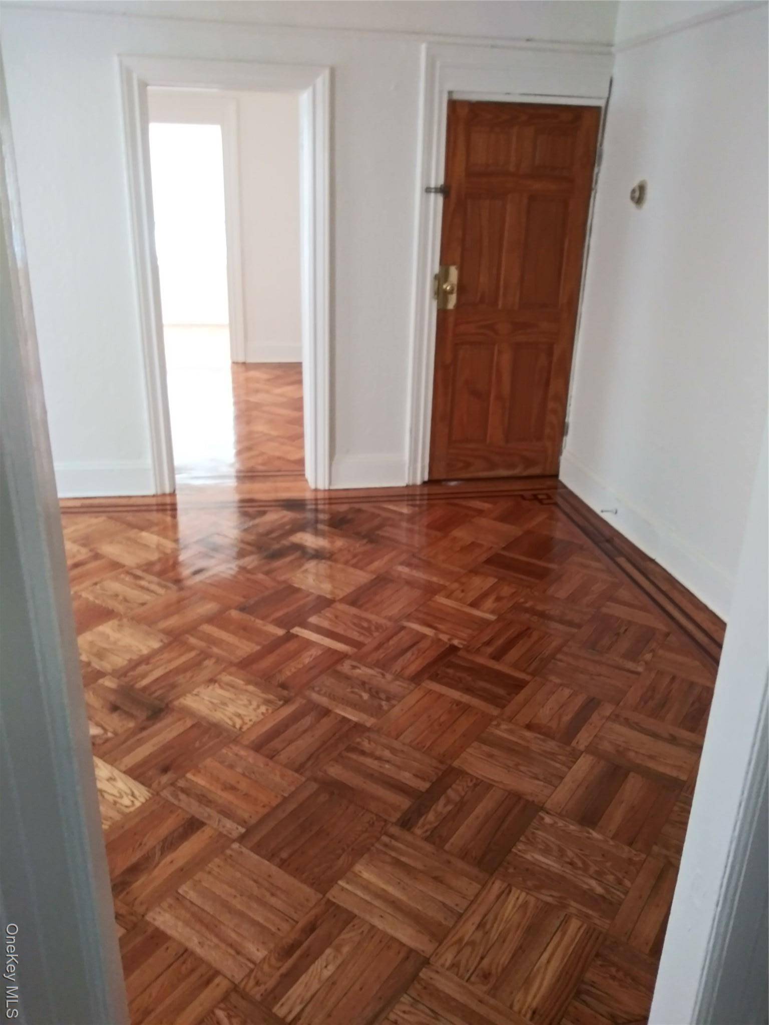 Don t miss the chance to own a beautiful brick, semi detached legal two family home in one of the most desirable neighborhoods of Queens.