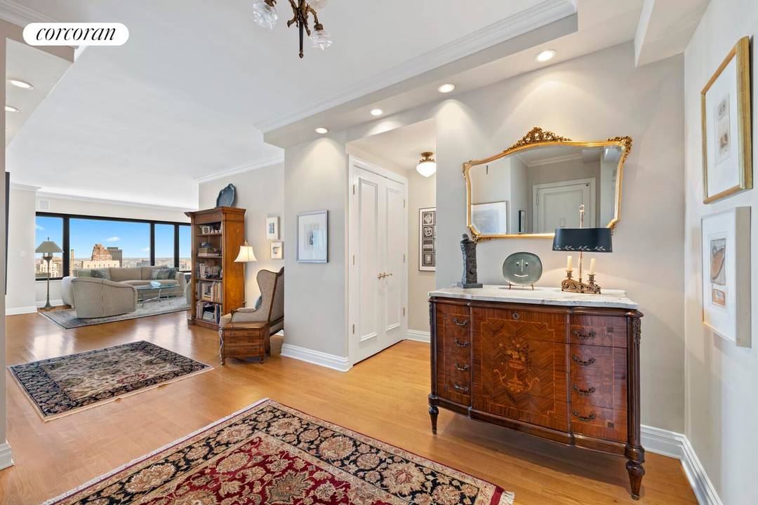 Beautifully renovated with sweeping river and city views throughout, this 42nd floor 2BR, 2.