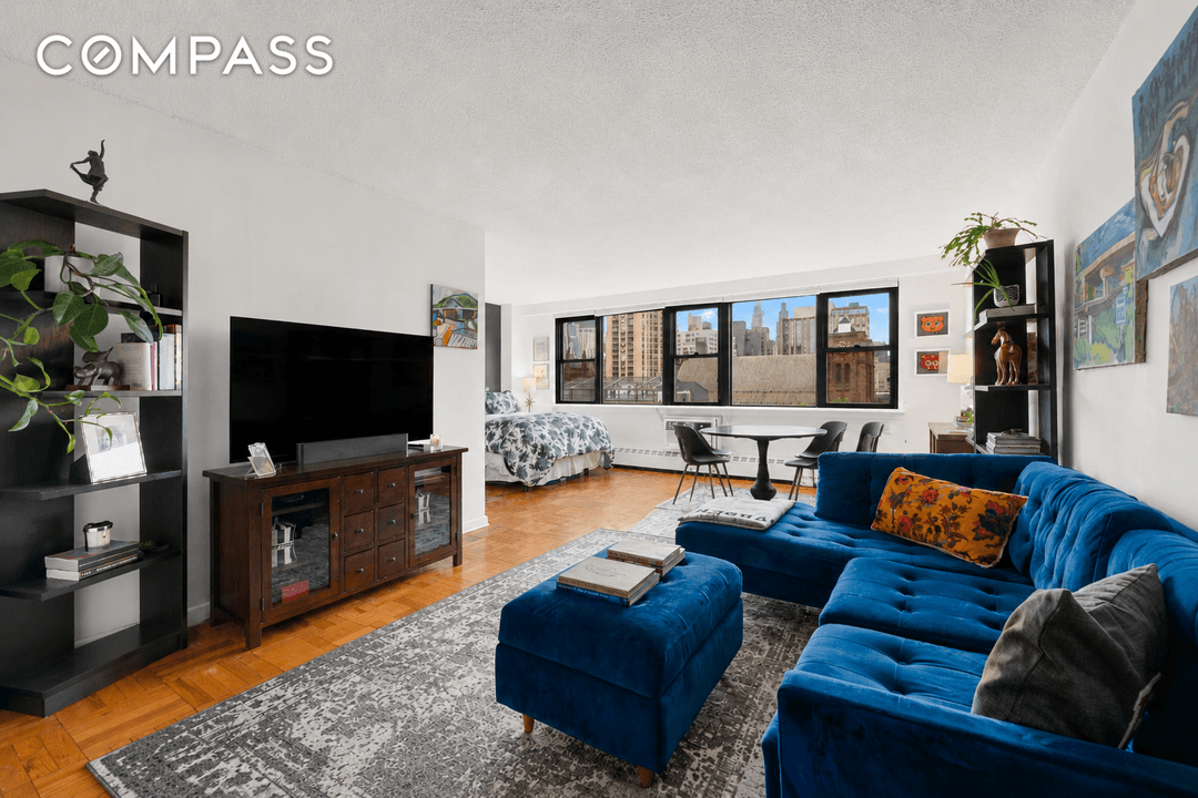 Welcome home to this sun drenched alcove studio with sweeping, unobstructed views overlooking Stuyvesant Square Park.