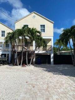 PROPERTY IS DETACHED CONDOMINIUM WITH CBS CONSTRUCTION NEW METAL ROOF IMPACT WINDOWS, PRIVATE POOL AND PRIVATE YARD.