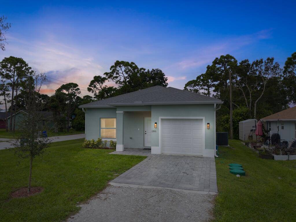 Welcome to 1395 17th Ct SW in beautiful Vero Beach a newly built 3 bedroom, 2 bath concrete block home offering modern finishes, impact windows and doors, sleek tile flooring ...