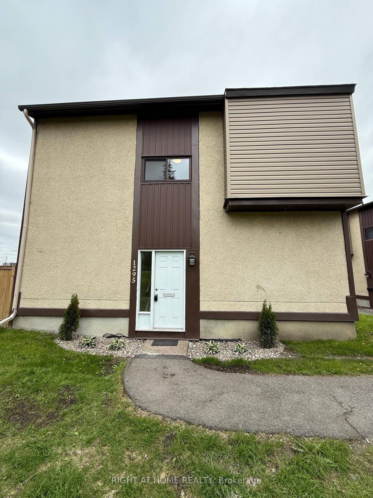Welcome to this updated 3 bedroom 2 bath townhome condo corner unit.