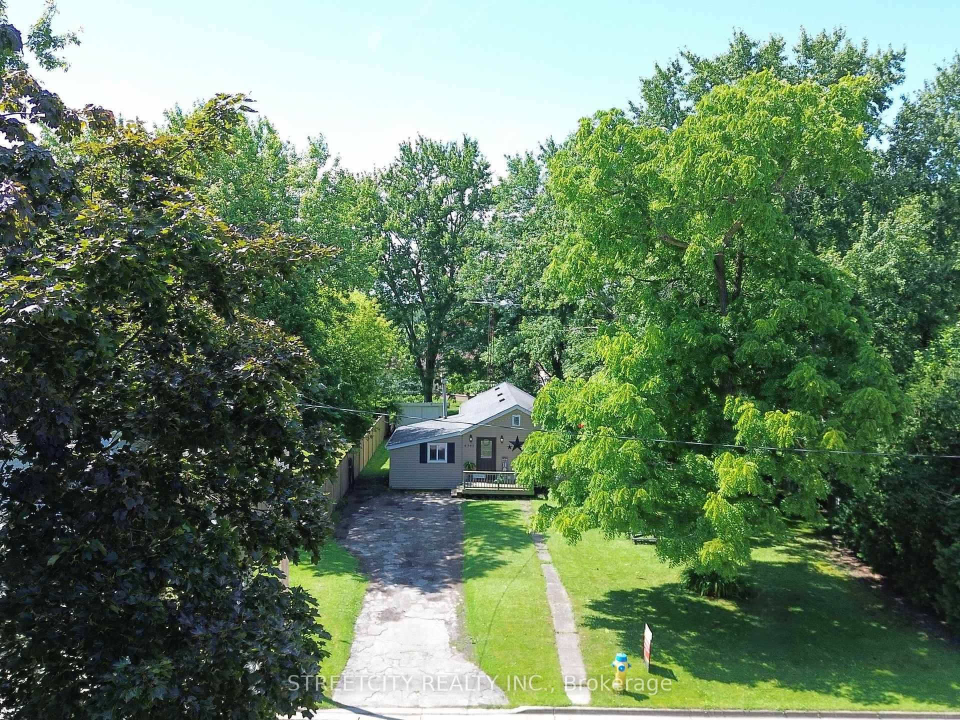 This 3 bedroom, 1 bath home sits on a deep 75 x 150 lot, offering the perfect mix of privacy and potential.