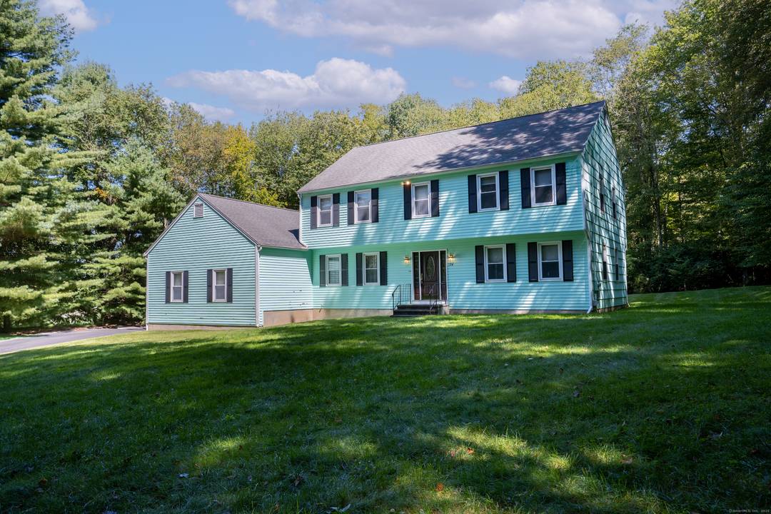 Discover serene suburban living in this classic Colonial at 124 Bagburn Road.