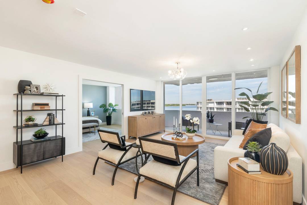 Experience breathtaking water views from this fully renovated residence, complete with a private balcony in one of Palm Beach Island's most prestigious intercoastal communities.