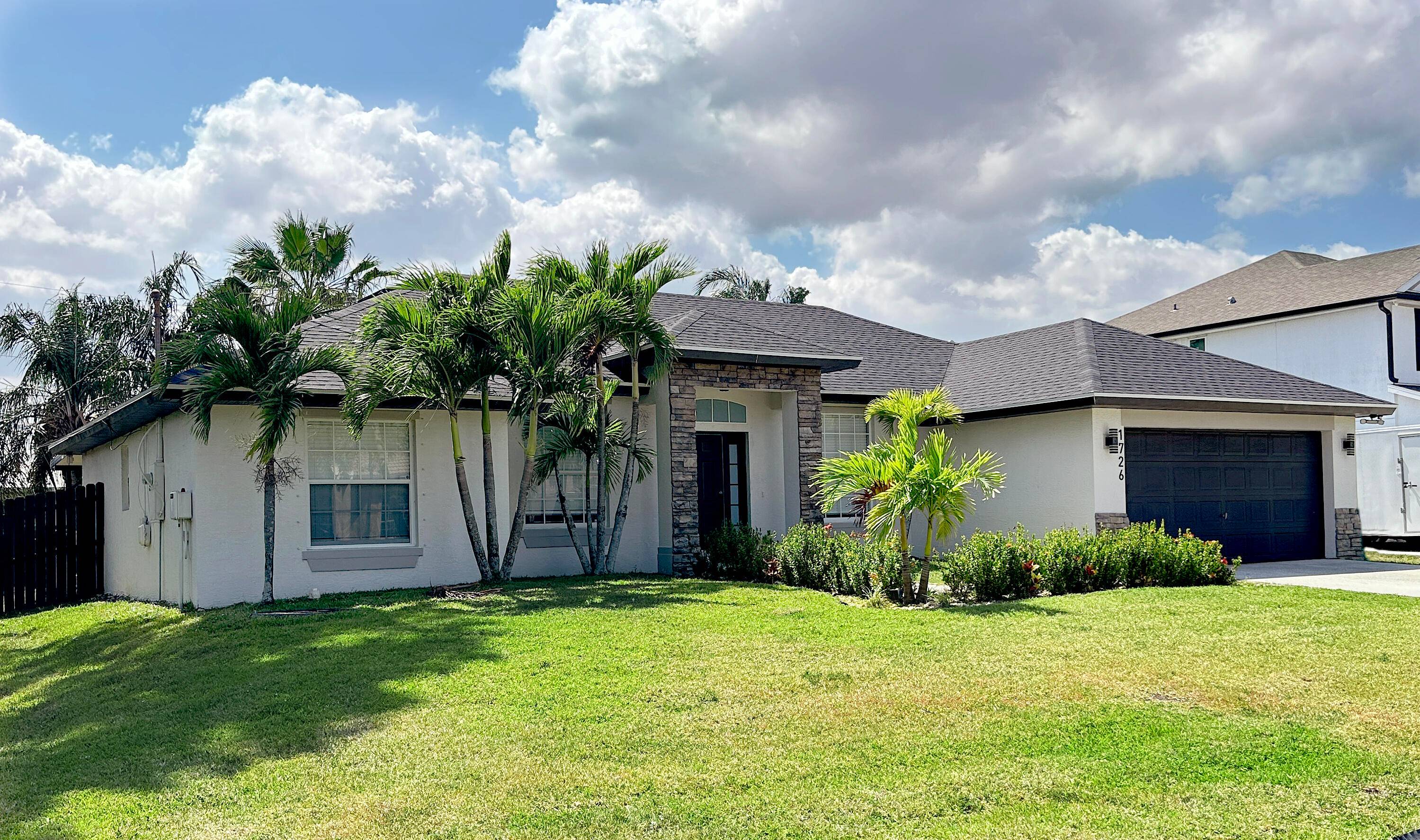 Beautifully updated 3 bedroom, 2 bath CBS home with den playroom in a desirable Port St.