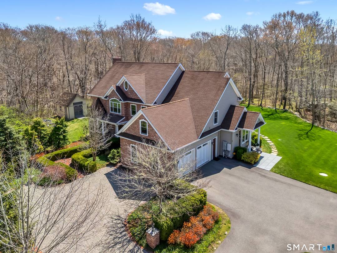 Set on nearly 5 private acres in Stonington, this exceptional custom built Colonial offers the perfect blend of luxury, space, and versatility.