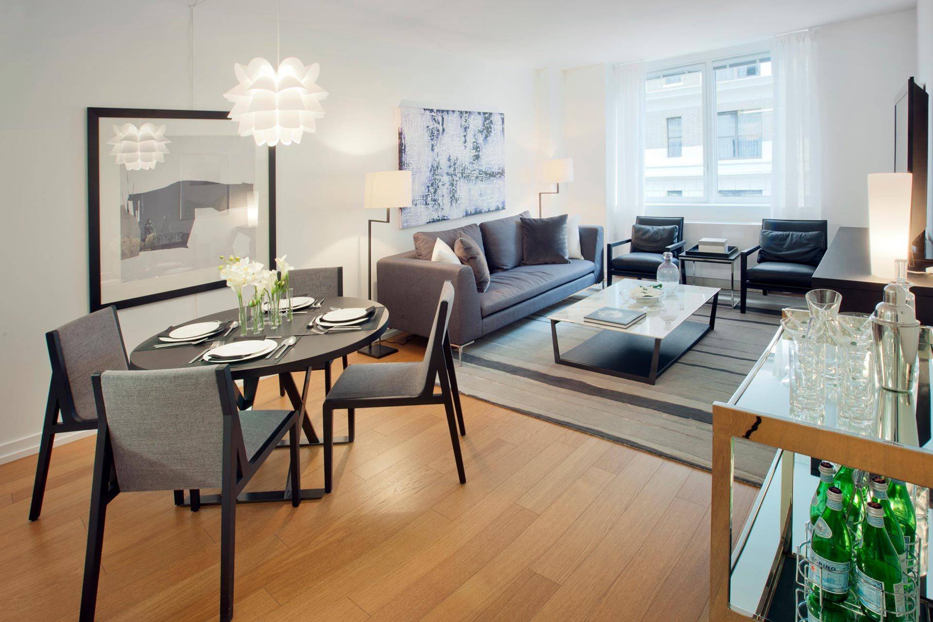 Great one bedroom featuring an open gourmet kitchen with stainless steel appliances including a smart fridge with LCD display, stone countertops and eating bar, a contemporary bath with TV in ...