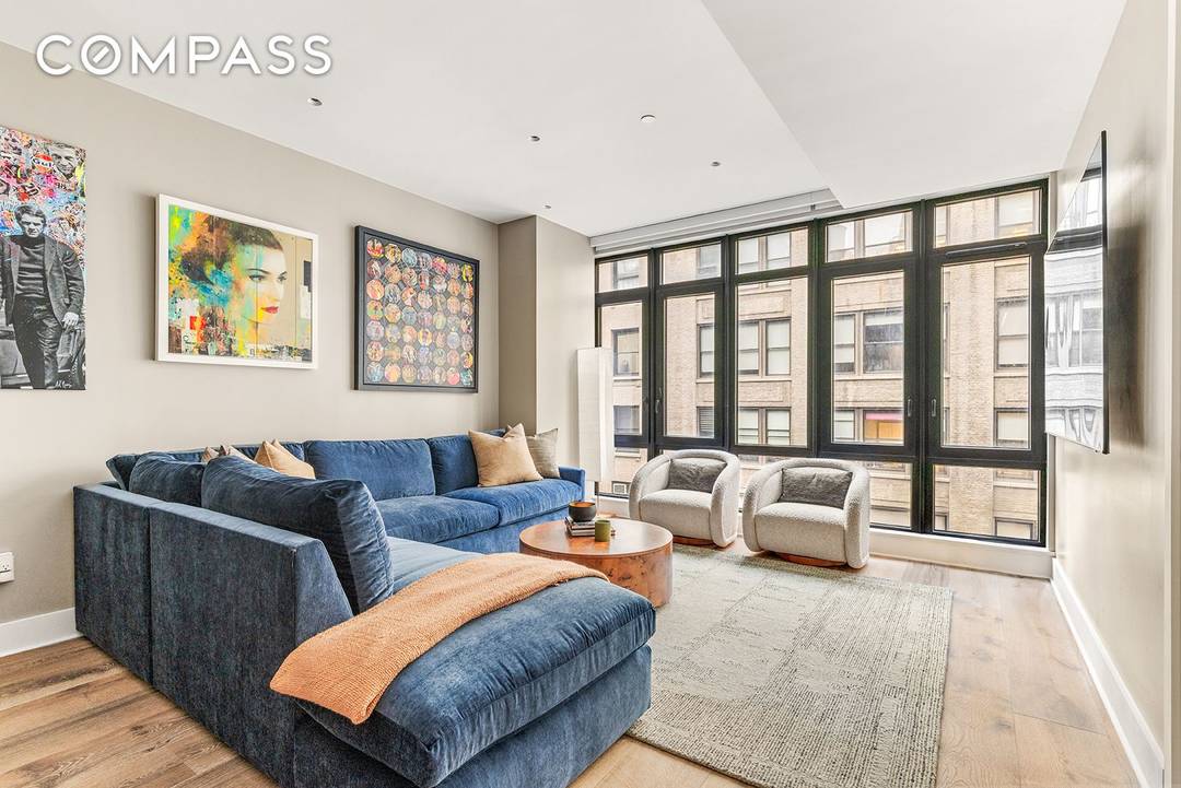 128 W 26th Street, 10 is a bright, contemporary 1, 426 square foot, floor through apartment.