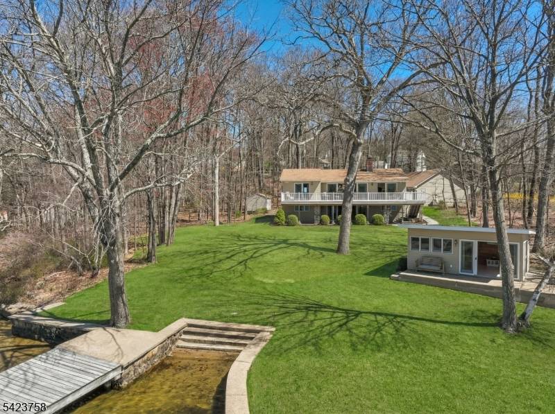 A truly unique opportunity to own a private, premier lakefront estate on the shores of Lk.