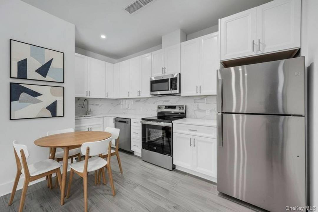 NEW CONSTRUCTION.... Be the FIRST to Experience Contemporary Living in this BRAND NEW 2 BEDROOM 1 BATH RENTAL Apartment that offers both Convenience and Luxury in an Exceptional Location near ...