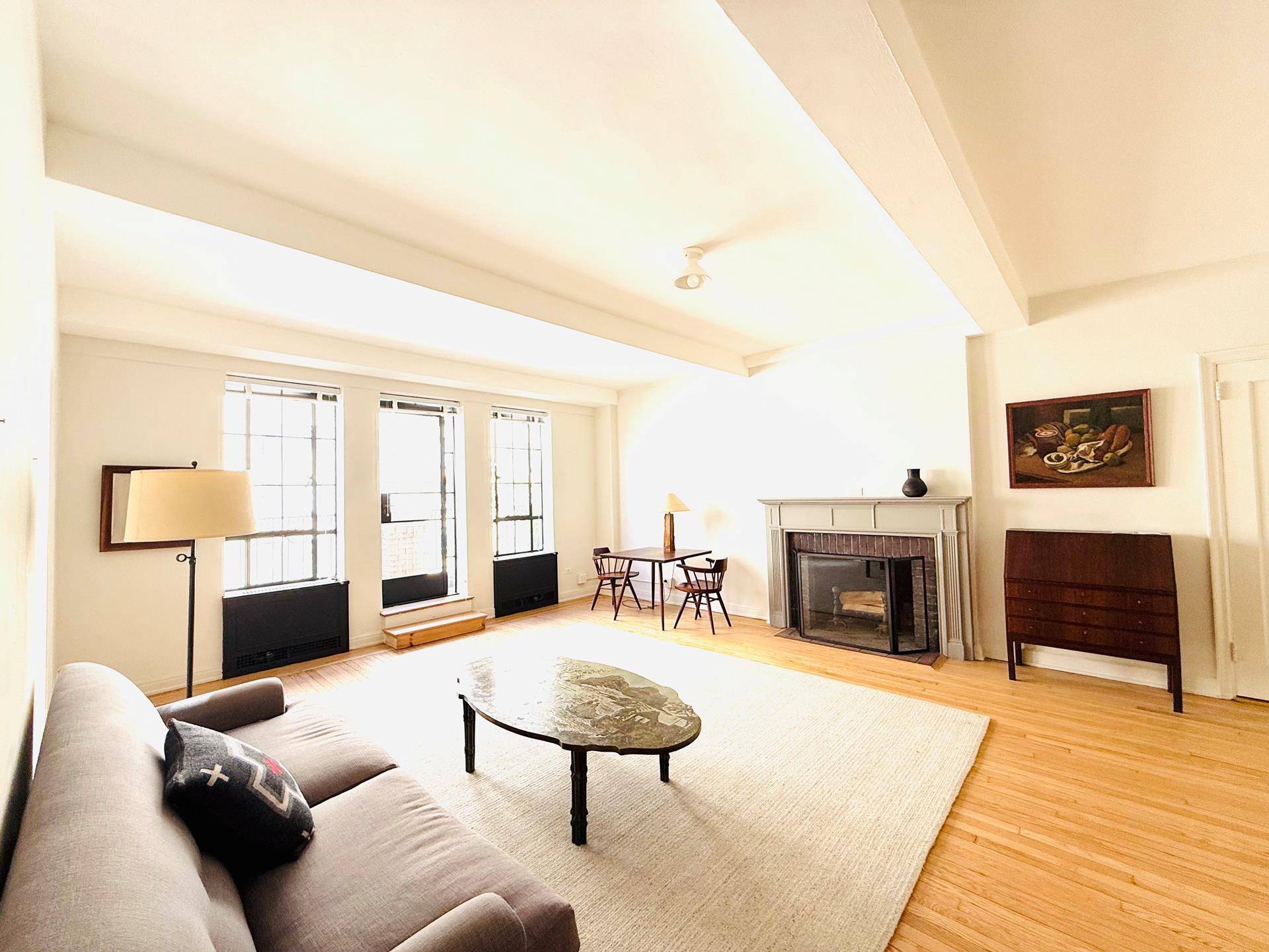 Experience the height of luxurious living in this elegant pre war condominium, complete with a private terrace and a wood burning fireplace.
