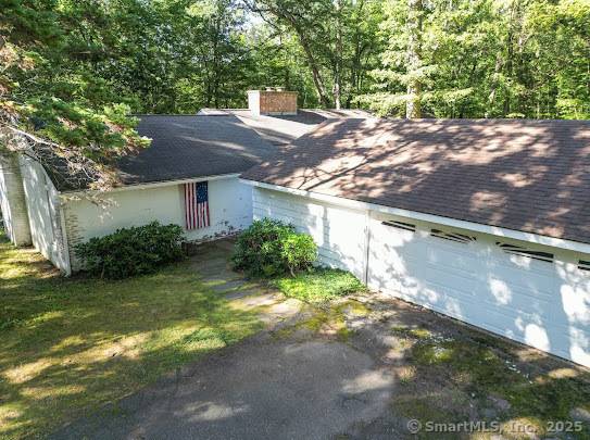 Sprawling 4 bedroom, 2. 5 bath Mid Century Ranch in desirable South Glastonbury, offering approx.