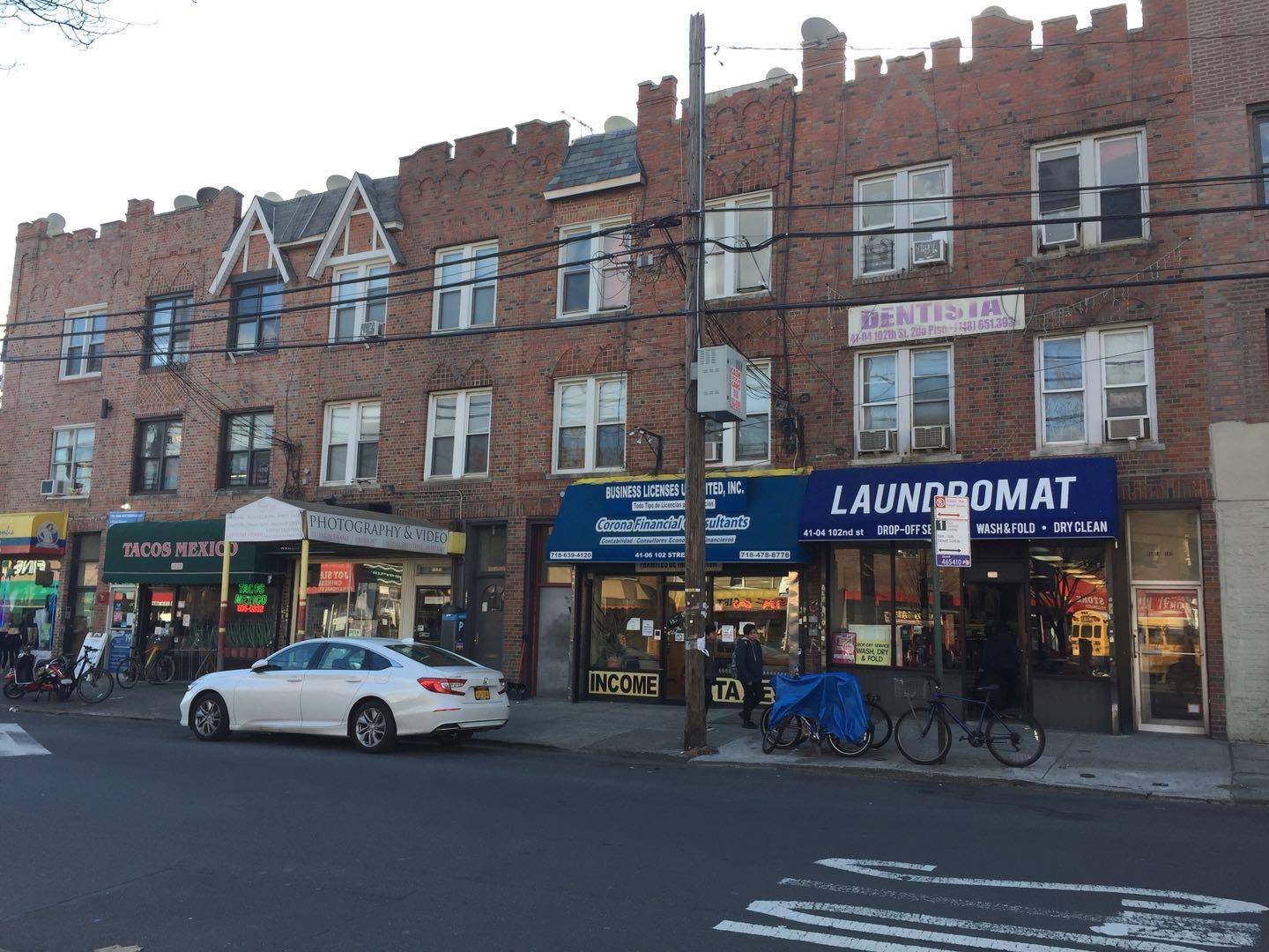 R6, C2 3 Mix use building with laundromat on ground floor, and apartments on second and third floor.