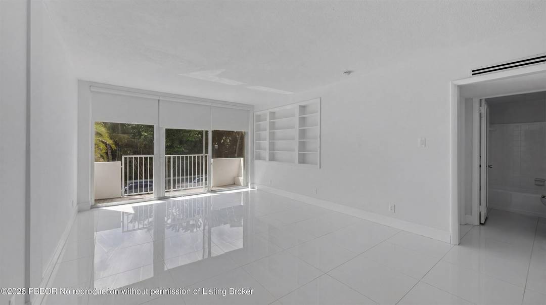 Light, bright, and airy, this inviting residence enjoys one of the best locations in town just one block from iconic Worth Avenue and three blocks from the ocean.