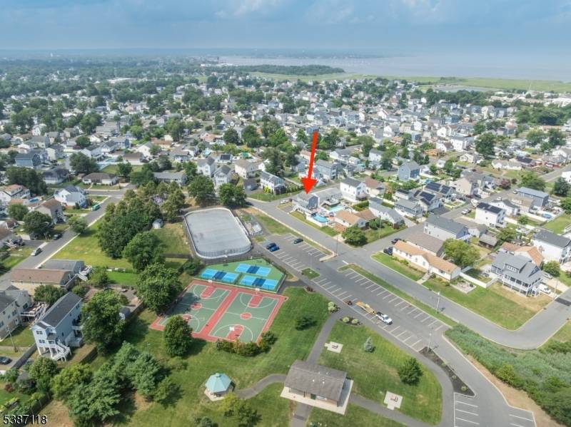 Coastal living meets modern comfort in this beautifully updated home located on a quiet street directly across from a peaceful open space park.