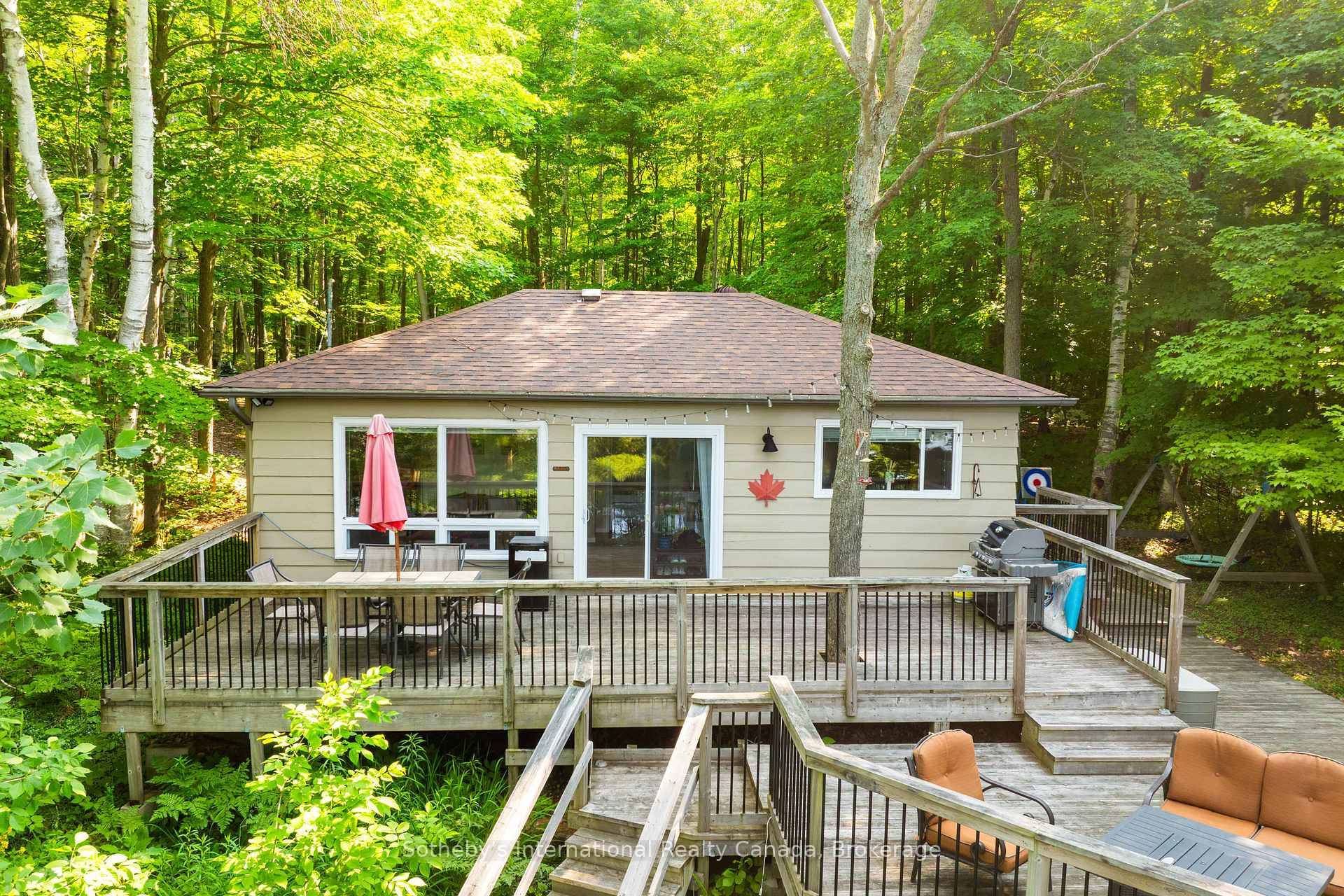 Discover your dream getaway at 1022 Summit Road, nestled on the sought after shores of Nine Mile Lake.