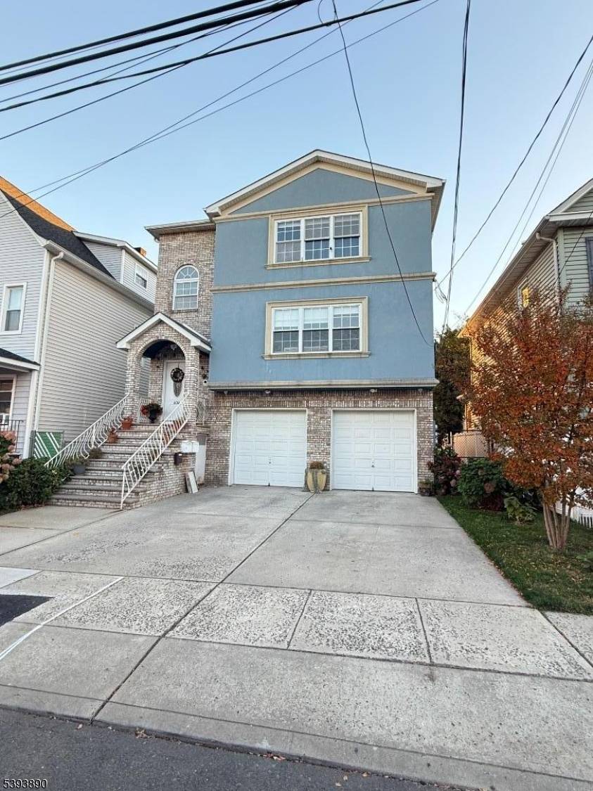 Spacious 2 family home featuring 2 units with 4 bedrooms and 2 full baths each.