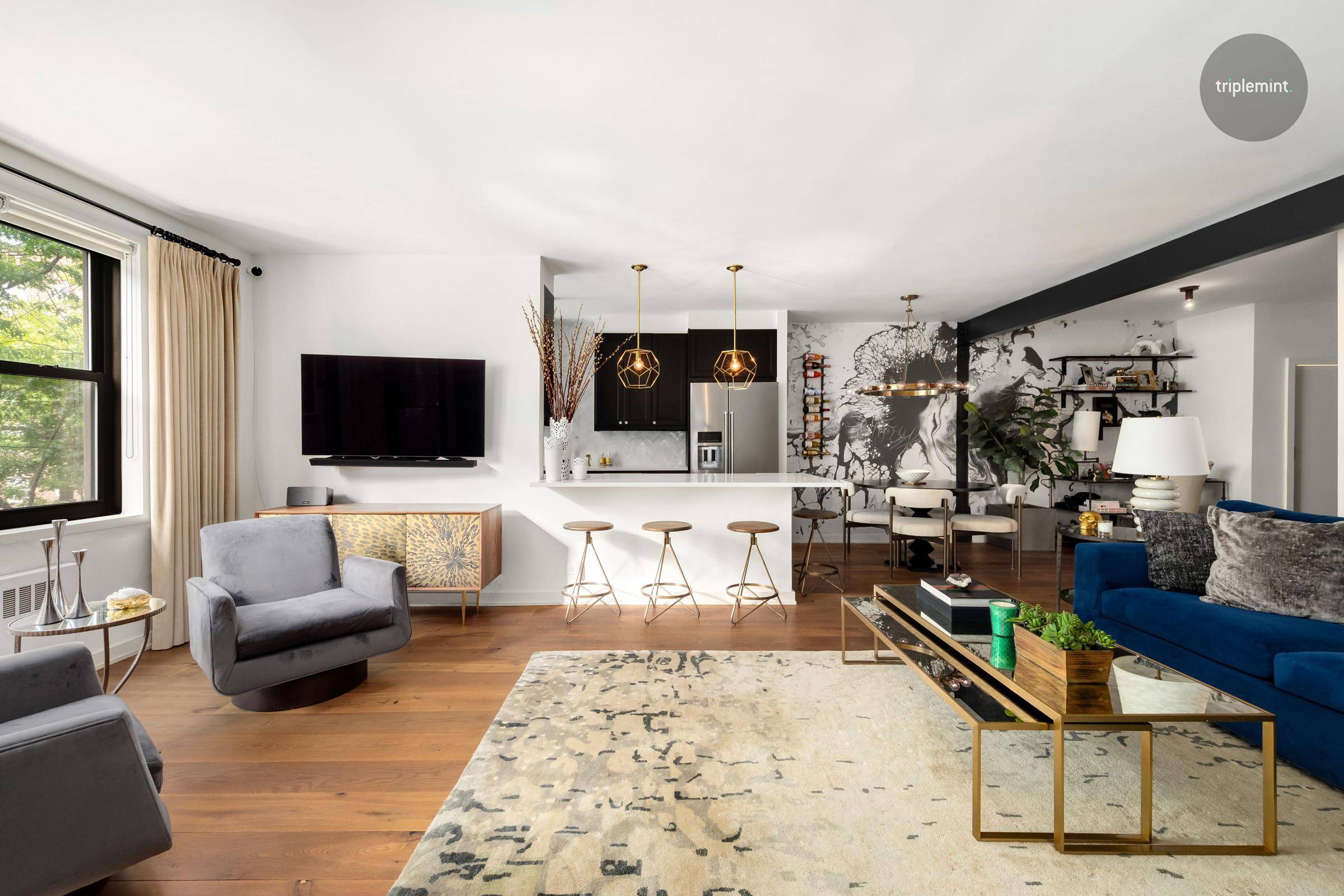 Immaculately renovated home with a balcony completed with the attention to detail not seen in Forest Hills.