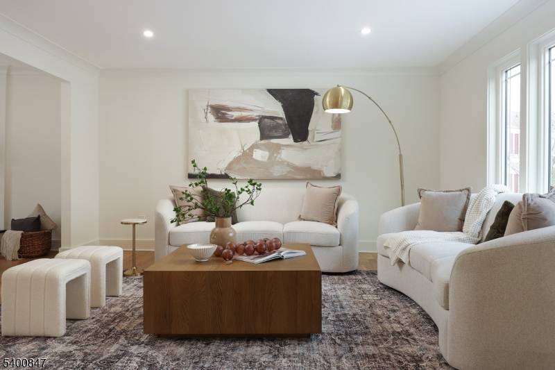 MUST SEE ! Experience elevated living in this beautifully designed 5 bedroom, 3.