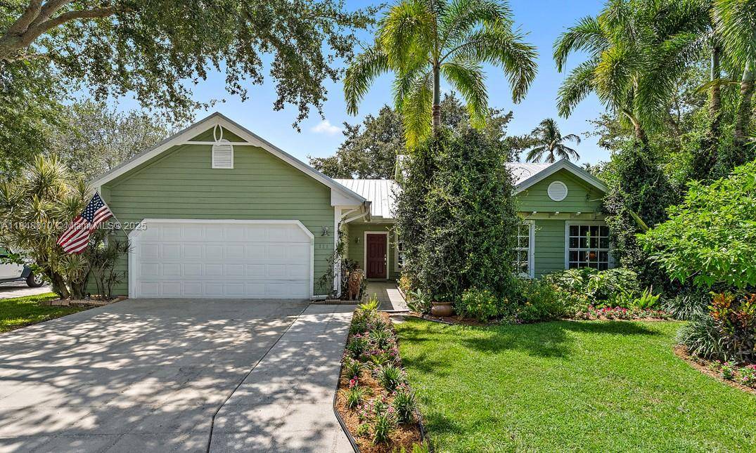 This Key West style home is yours to step into !