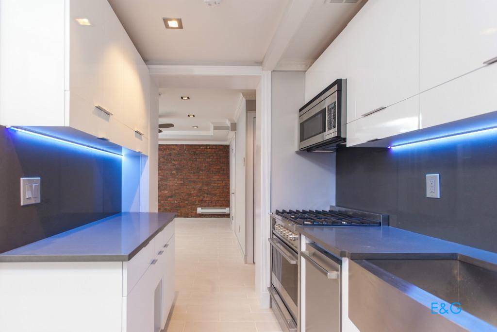 Renovated 3 bedroom apartment with large private garden, features 2 marble bathrooms, washer amp ; dryer, and granite kitchen with dishwasher.