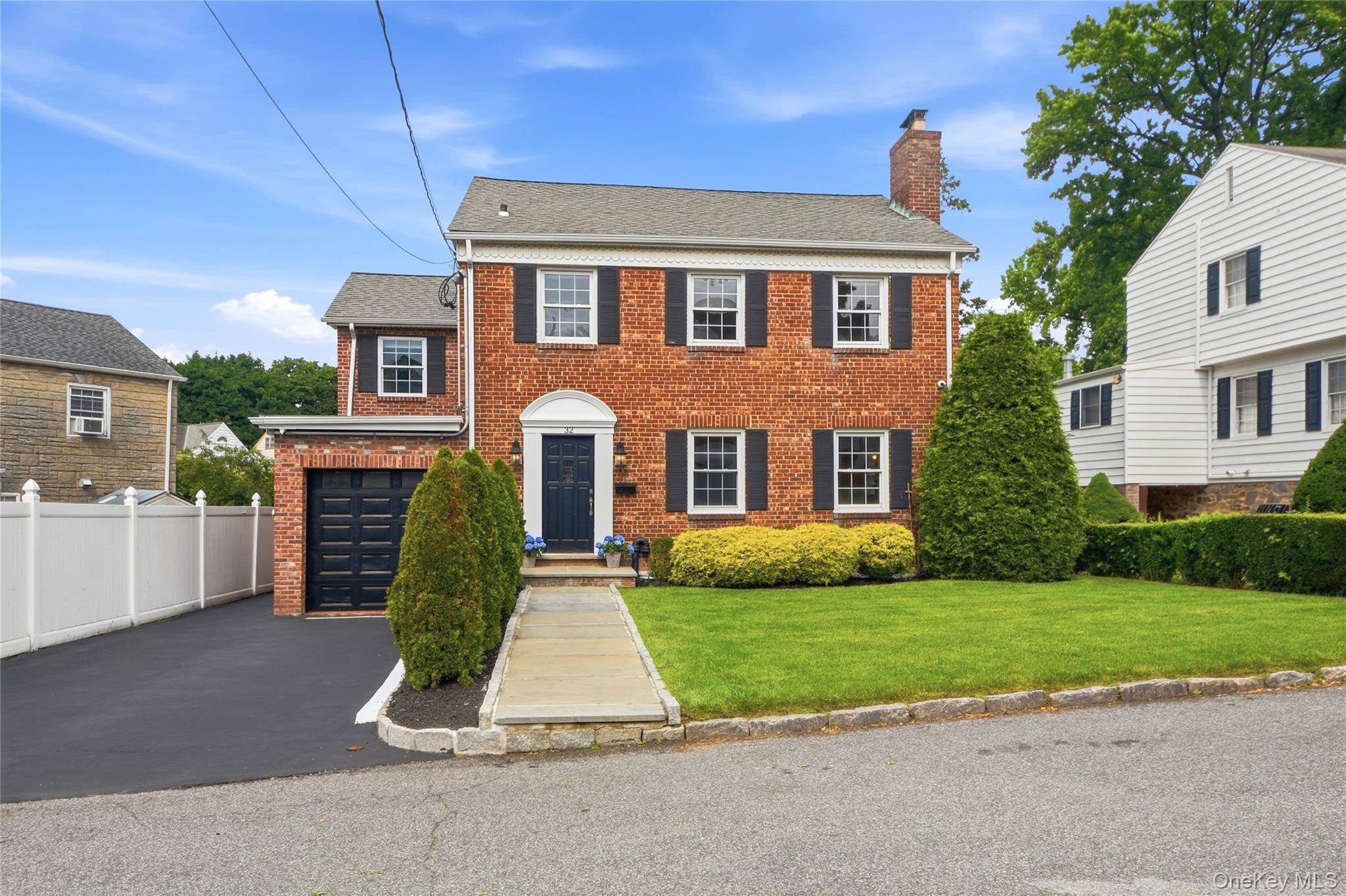 Welcome to this beautiful Colonial that perfectly blends timeless character with modern comfort.