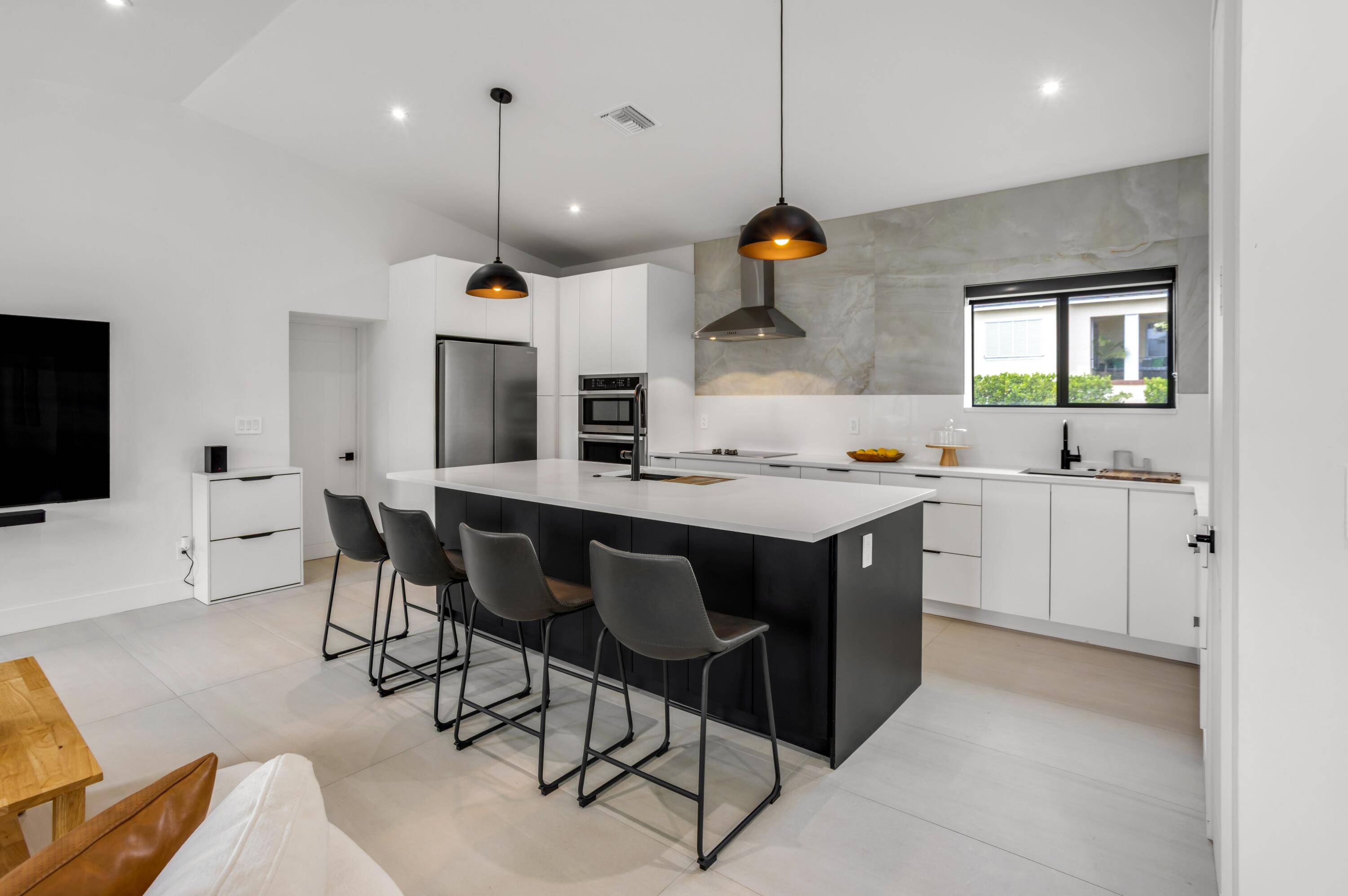 Offering a unique opportunity for custom new construction, this well designed residence and guest house boast 3, 701 total square feet in a premier West Palm Beach location.