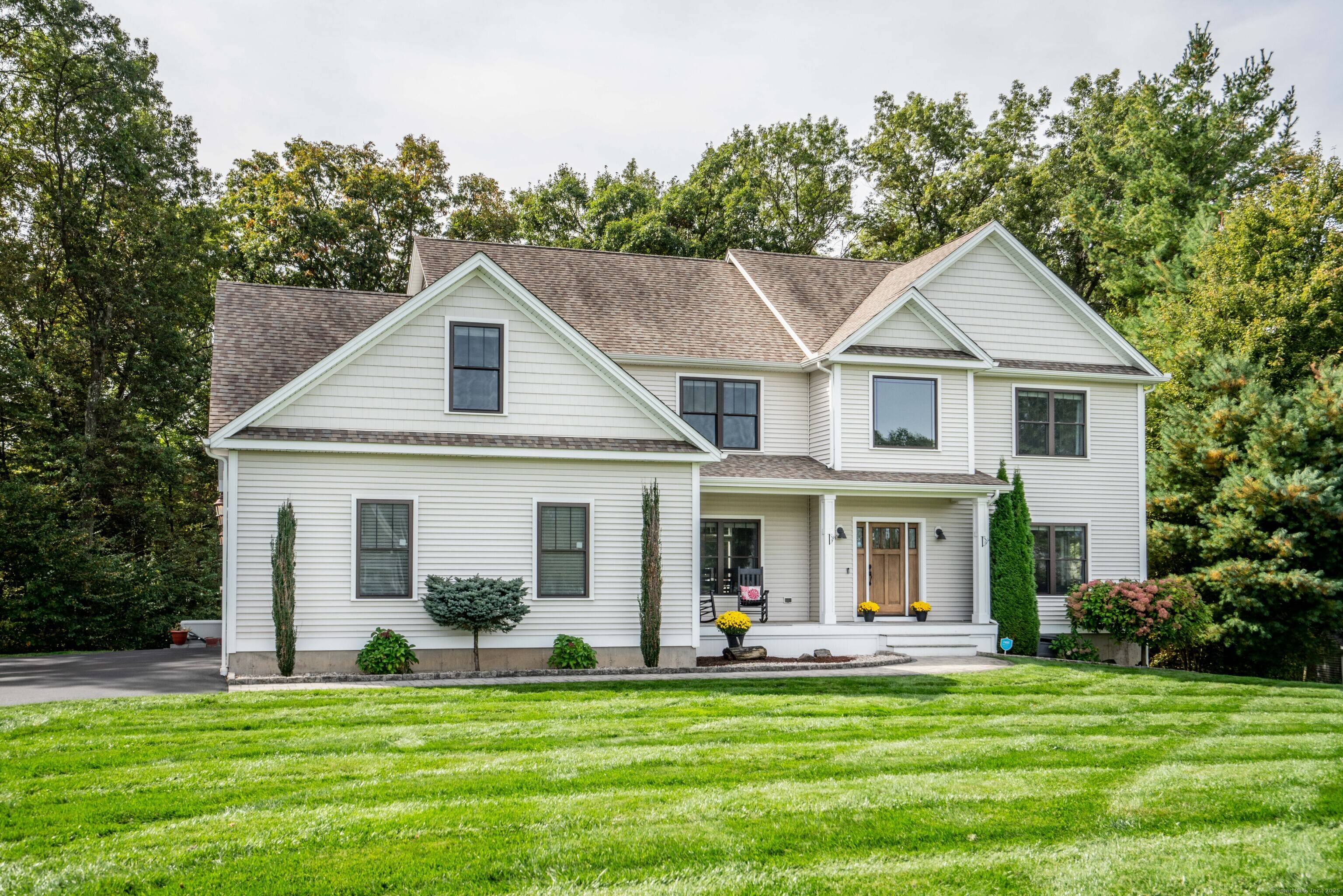 Step inside this custom built, colonial, designed for both character and efficiency.
