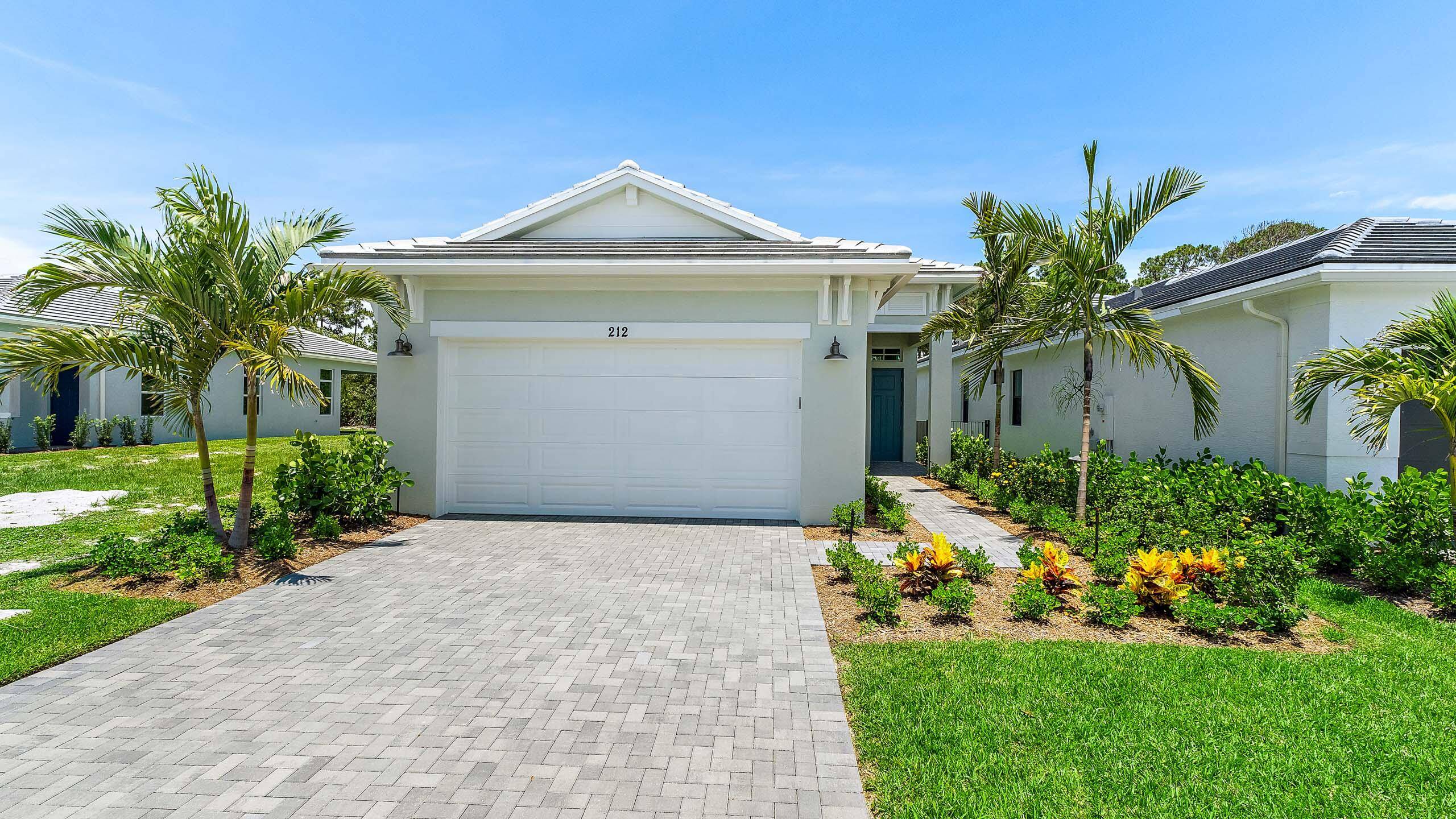 NEW CONSTRUCTION This Caroline floorplan offers the perfect blend of luxury and tranquility in the gated community of Rivella, surrounded by over 140 acres of natural preserve and mature trees.